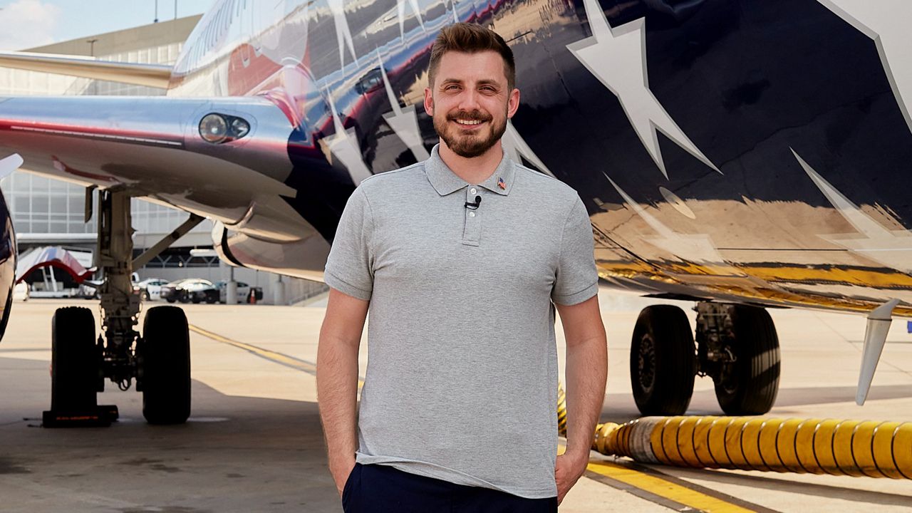 Pictured is 35-year-old Southwest Airlines senior graphics designer Eric Daniels. His design for Freedom One was chosen out of multiple designs to be painted on the aircraft. (Southwest Airlines)